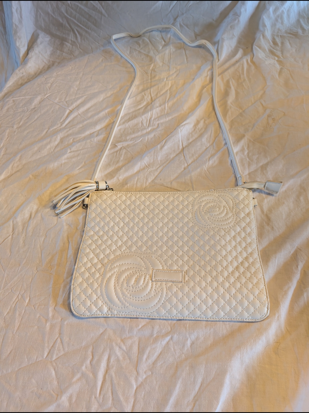 2/20$ White Quilted Crossbody Bag with Tassel Accent